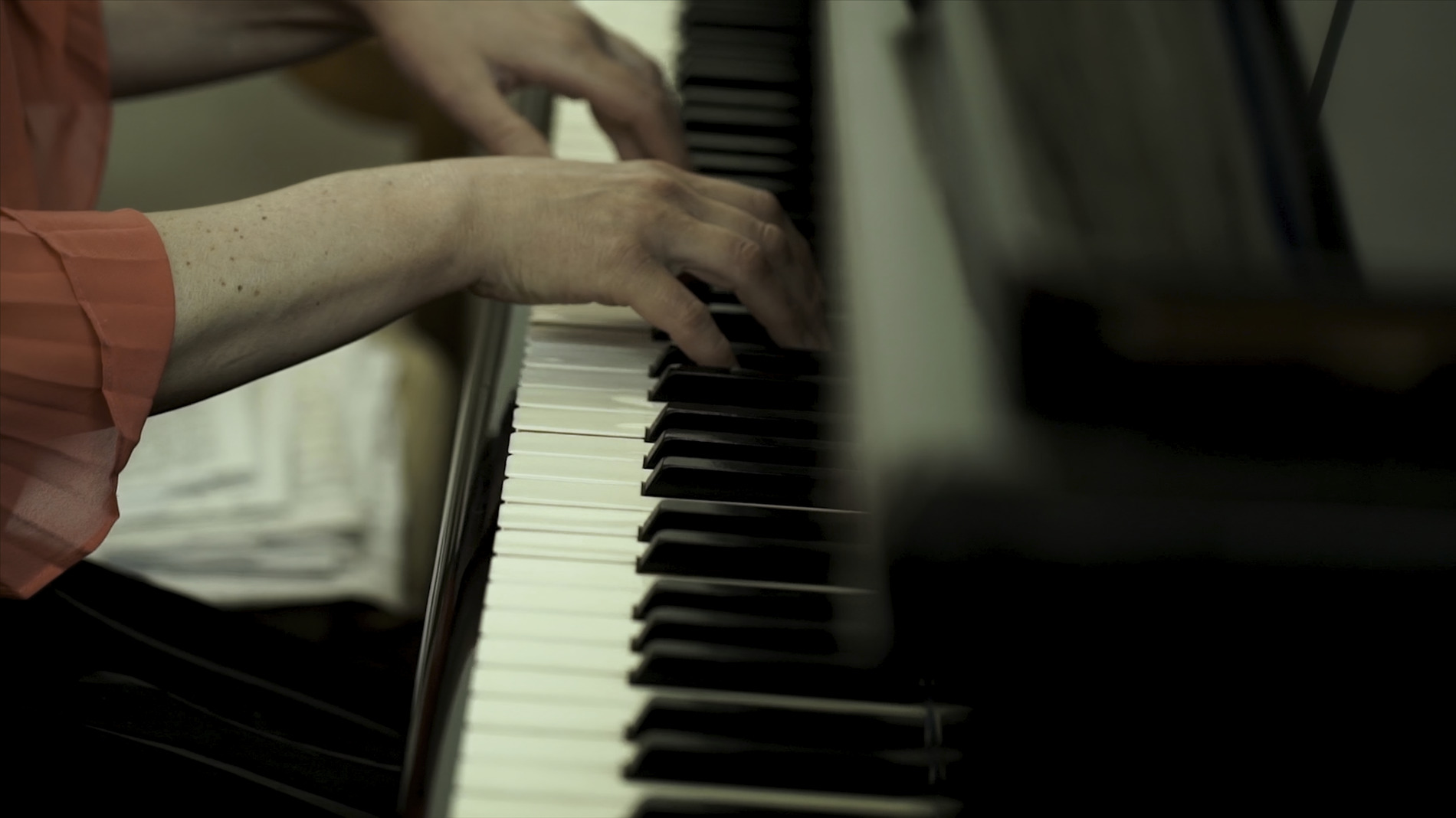 person playing a piano