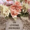 gravestone and flowers