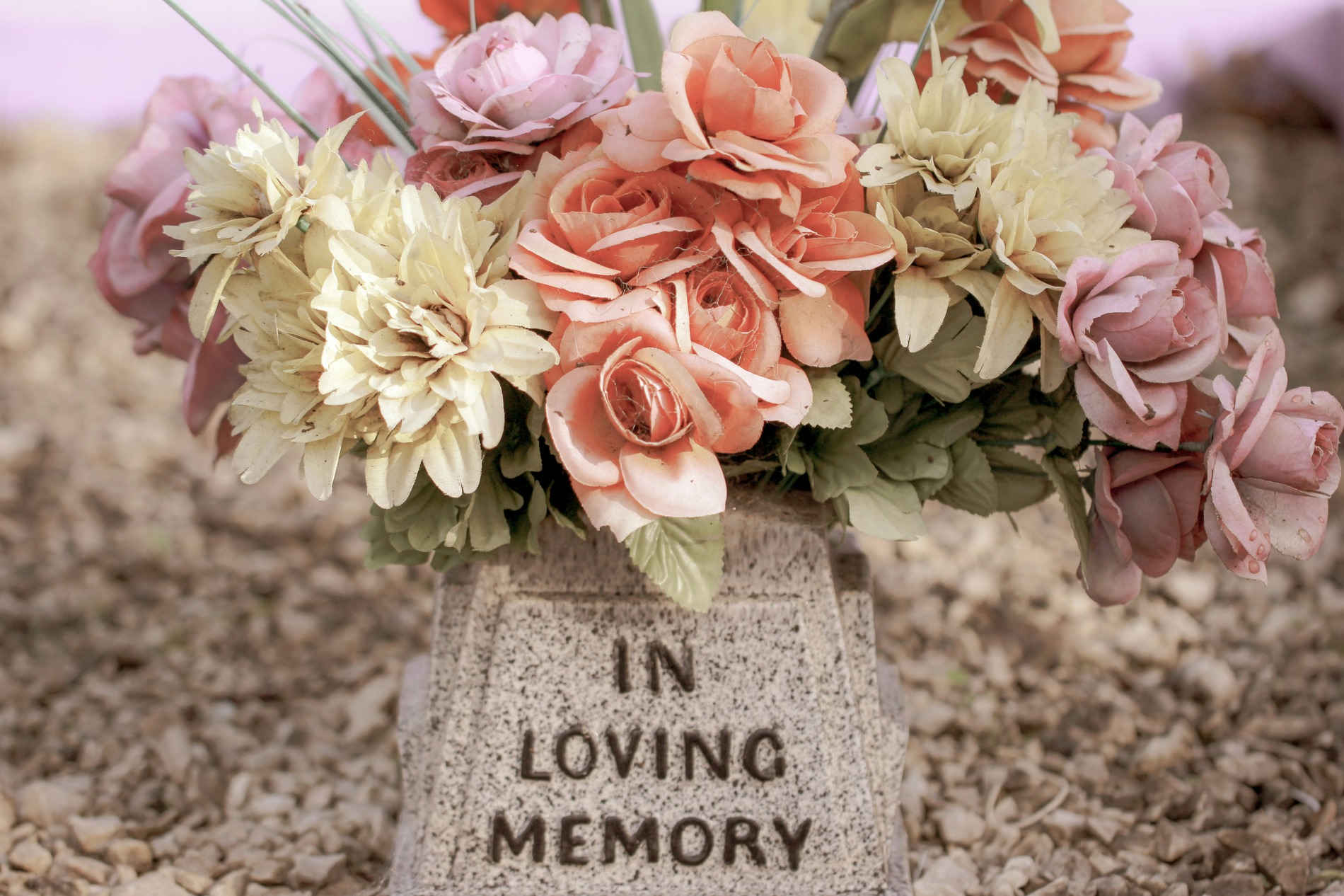 gravestone and flowers