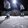People playing ice hockey